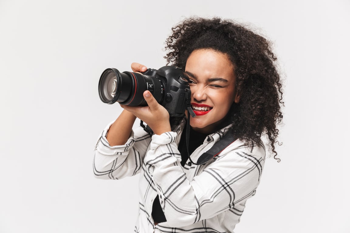 Portrait of a Woman taking Photos